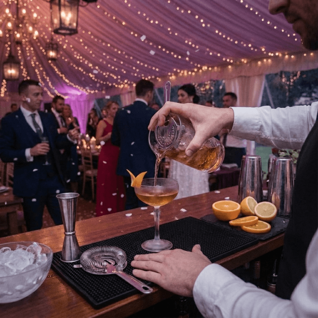 Professional bartender crafting a cocktail